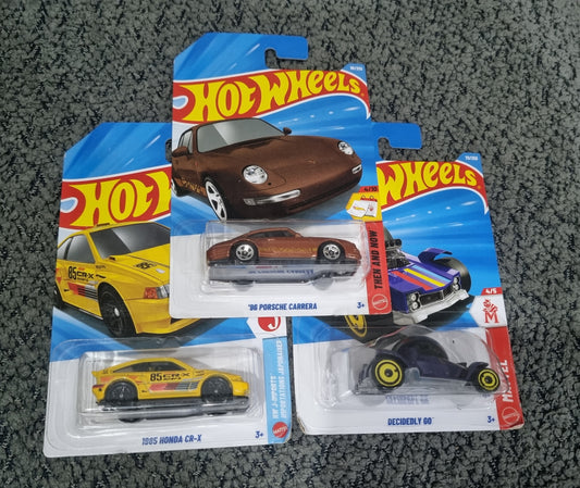 Hot Wheels 2026 Combo Pack (SET S1.3) – 96 Porsche Carrera, 1985 Honda CR-X & Decidedly Go (Set of 3 Die-Cast Cars)