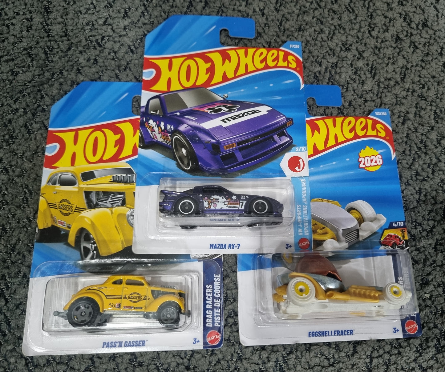 Hot Wheels 2026 Combo Pack (SET S3.4) – Mazda RX-7, Pass’n Gasser & Eggshelleracer (Set of 3 Die-Cast Cars)
