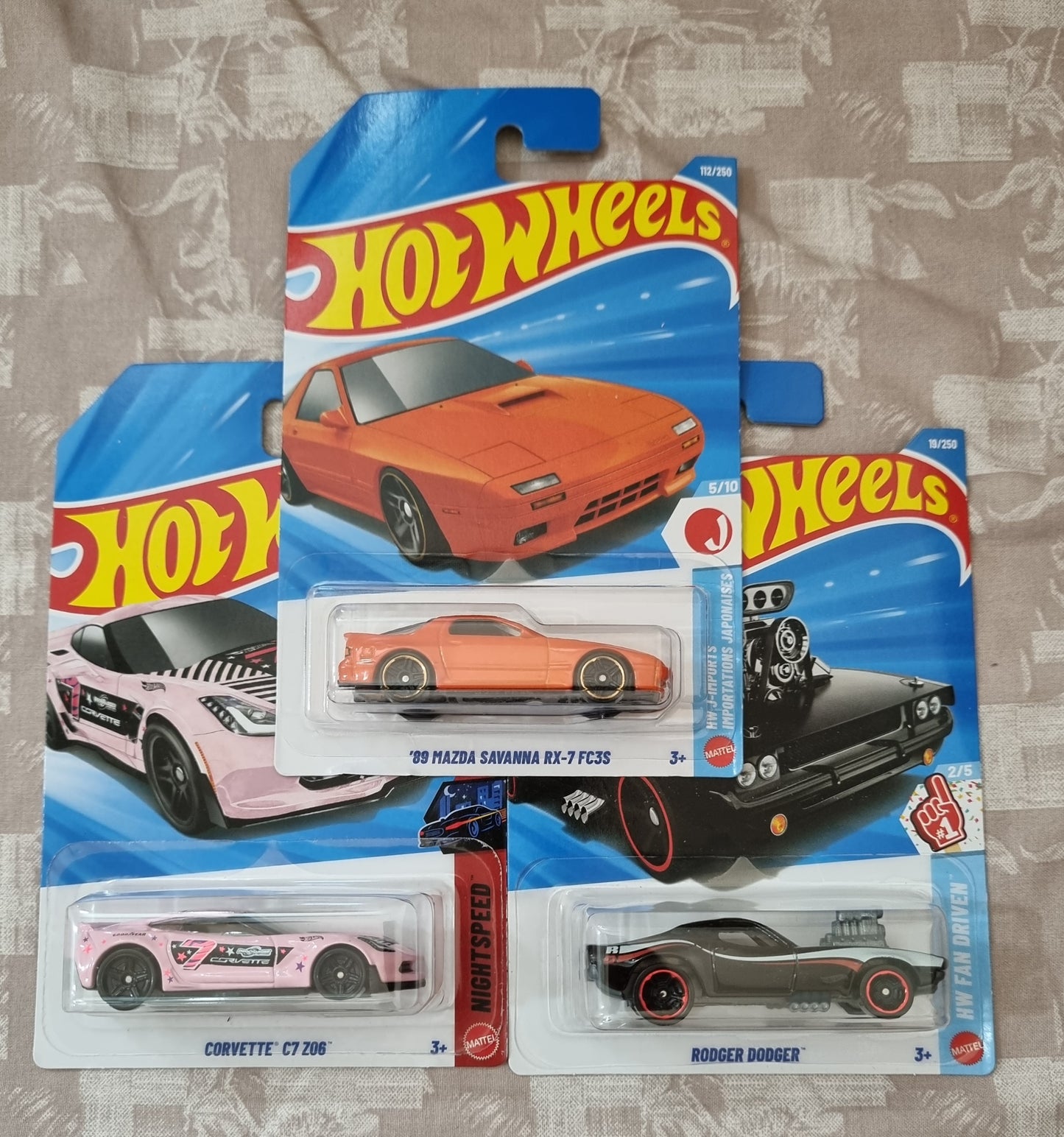 Hot Wheels 2026 F Case IMPORTED Combo (SET-F2.2) – ’89 Mazda Savanna RX-7 FC3S, Corvette C7 Z06 & Rodger Dodger (Set of 3)