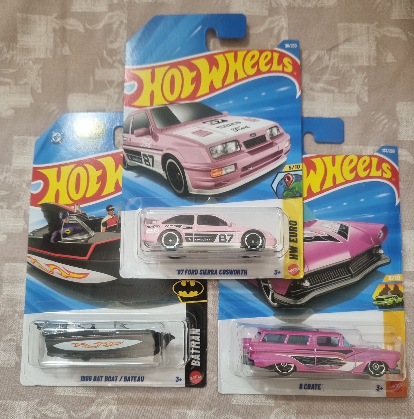 Hot Wheels 2026 F Case Imported Combo (SET-F3.6) – ’87 Ford Sierra Cosworth, 1966 Bat Boat/Bateau & 8 Crate (Set of 3)