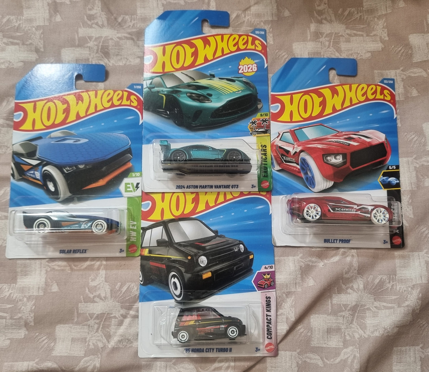 Hot Wheels 2026 F Case Imported Combo (SET-F4.1) – 2024 Aston Martin Vantage GT3, 85 Honda City Turbo II, Solar Reflex & Bullet Proof (Set of 4)