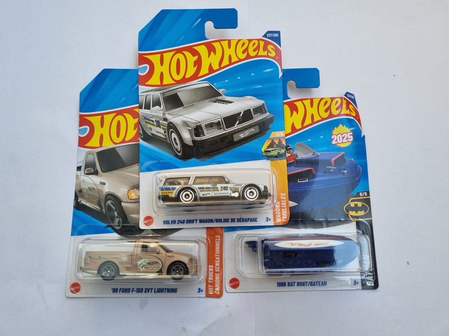 Hot Wheels 2025 M Case Imported Die-Cast Car Combo – Volvo 240 Drift Wagon, 99 Ford F-150 SVT Lightning & 1966 Bat Boat | 1:64 Scale Collectible