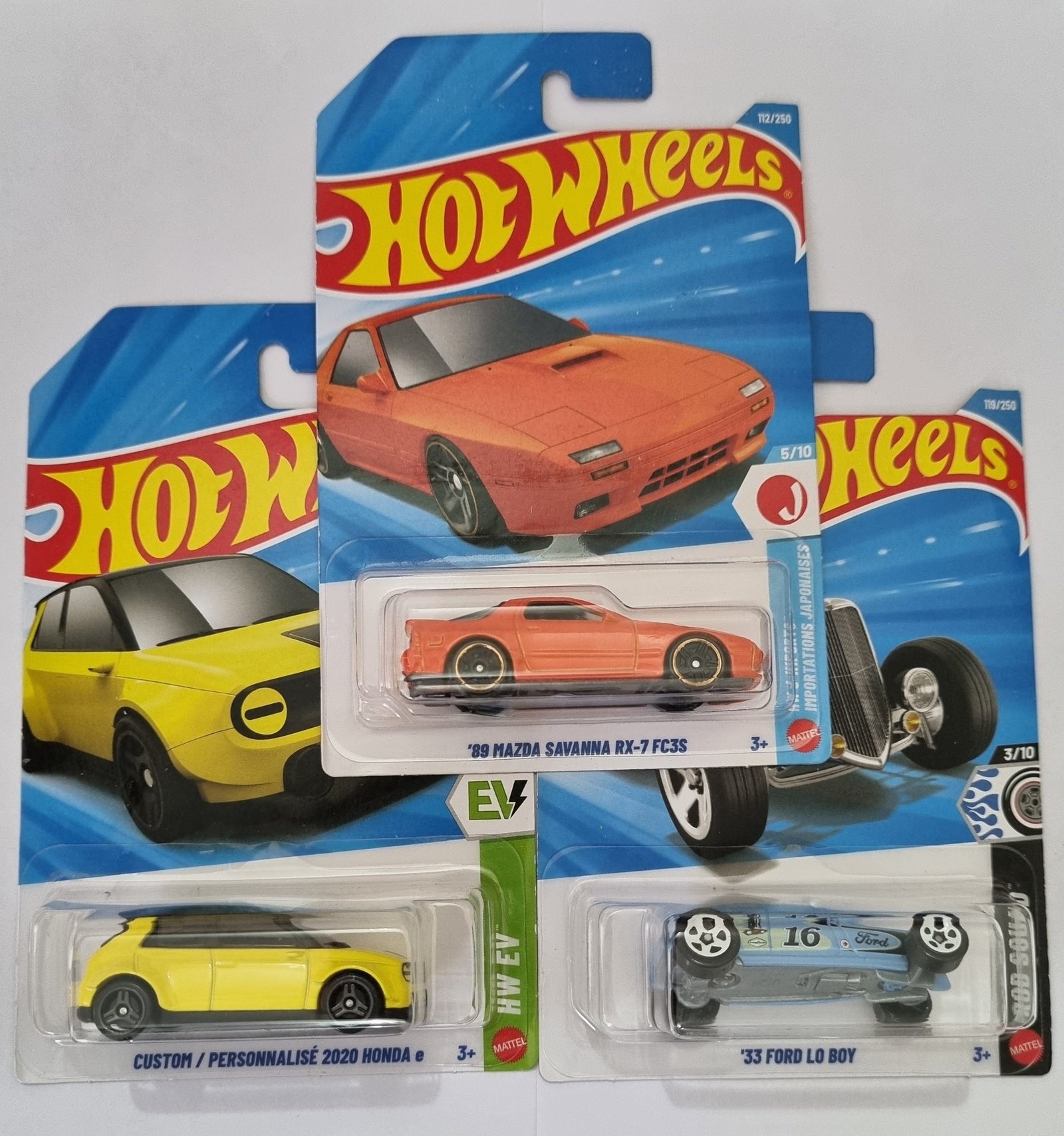 hot wheels f case 2026 combo pack – 89 mazda rx 7 fc3s + honda e (custom) + ’33 ford lo boy | 1:64 die cast cars (set of 3) hot wheels f case 2026 combo pack – 89 mazda rx 7 fc3s + honda e (custom) + ’33 ford lo boy | 1:64 die cast cars (set of 3)