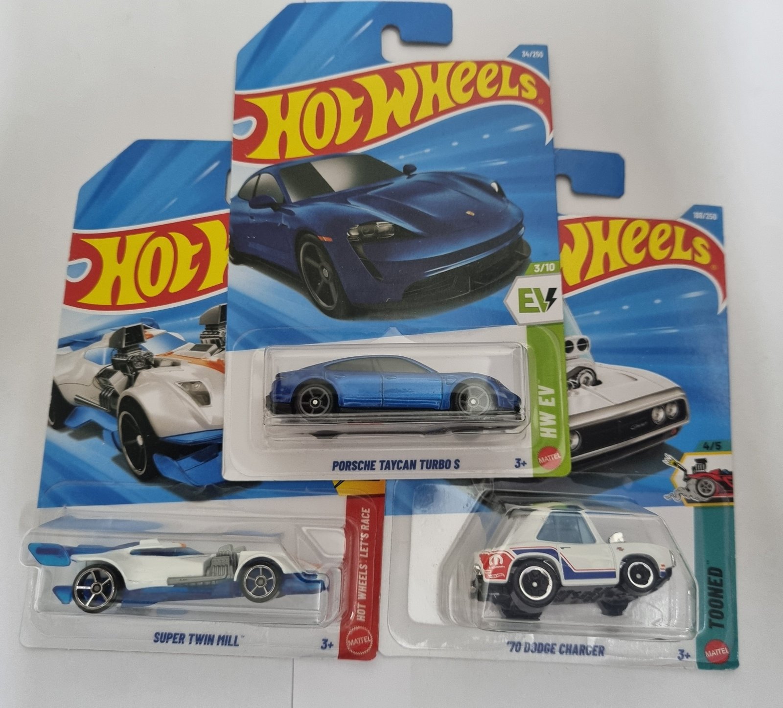 hot wheels j case 2026 combo pack – porsche taycan turbo s, super twin mill & ’70 dodge charger hot wheels j case 2026 combo pack – porsche taycan turbo s, super twin mill & ’70 dodge charger