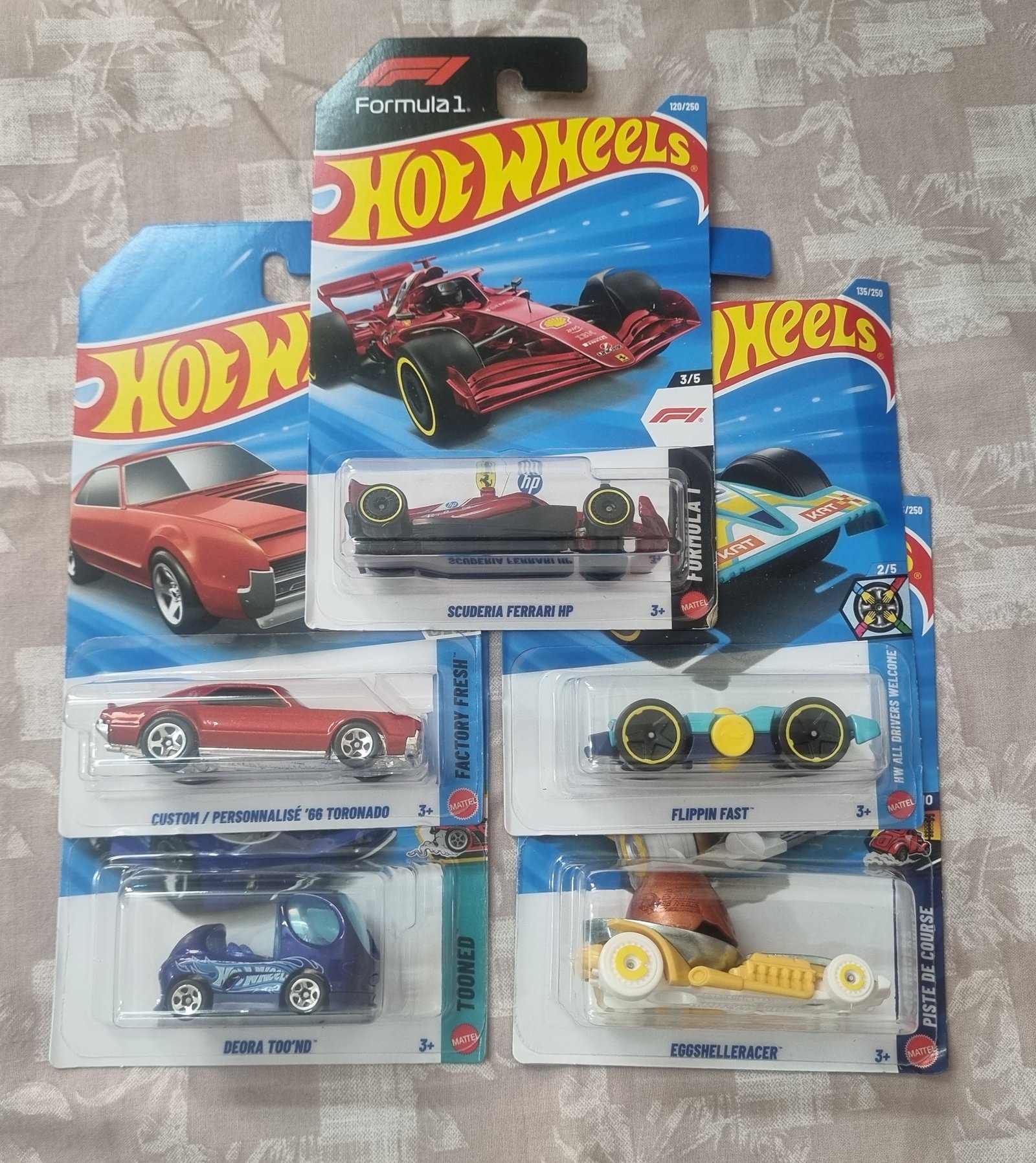hot wheels 2026 f case imported combo (set f1.1) – scuderia ferrari hp, custom/personnalise ’66 toronado, deora tod nd, flippin fast & eggshelleracer (set of 5) hot wheels 2026 f case imported combo (set f1.1) – scuderia ferrari hp, custom/personnalise ’66 toronado, deora tod nd, flippin fast & eggshelleracer (set of 5)